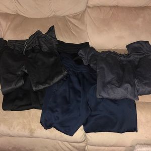 Four pairs men’s track/gym pants.